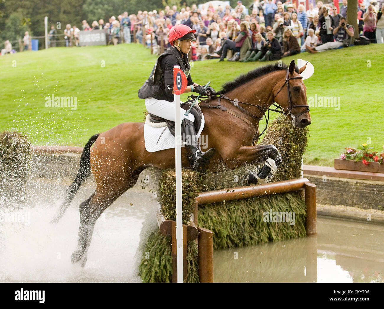 01.09.2012. Burghley House Stamford, England.   Lucy Jackson (NZL) riding WILLY DO in action during the cross country phase of The Land Rover Burghley Horse Trials. Stock Photo