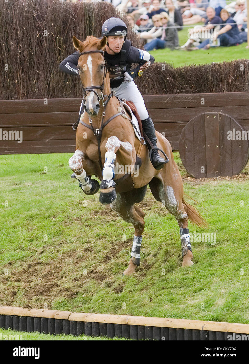 01.09.2012. Burghley House Stamford, England.   Oliver Townend (GBR) riding ARMADA in action during the cross country phase of The Land Rover Burghley Horse Trials. Stock Photo