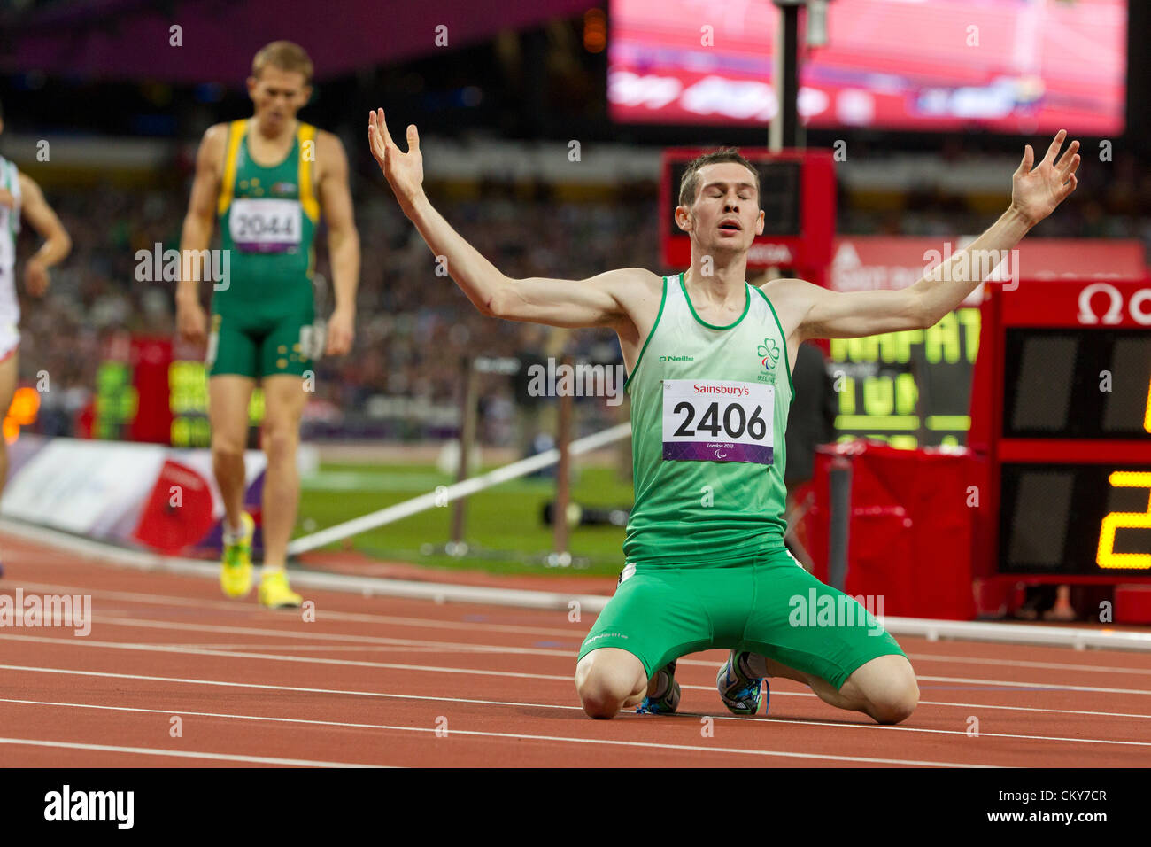 Ireland's Michael McKillop celebrates at the finish line after winning the men's 800 m T37 class at  the London Paralympics Stock Photo