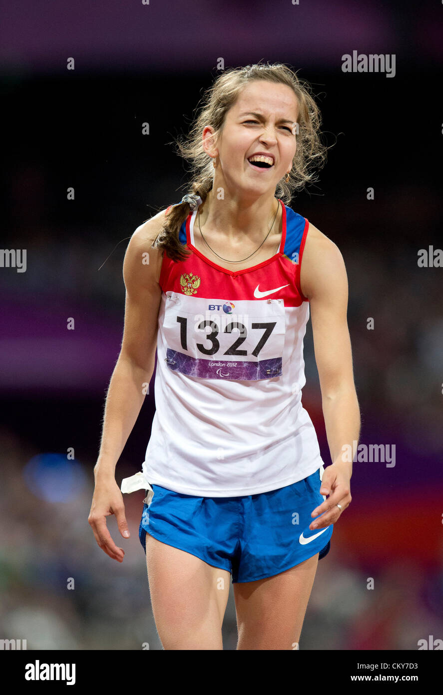 Elena Ivanova of Russia smiles at the finish line after winning the women's  200 meters T36 sprint at the London Paralympics Stock Photo - Alamy