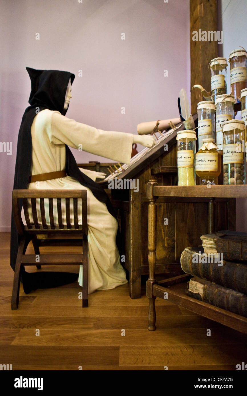 Saint Nicolas de Veroce (Upper Savoy,France) : Museum of sacred arts - Exposition of the 'treasure' : monk working at illuminate Stock Photo