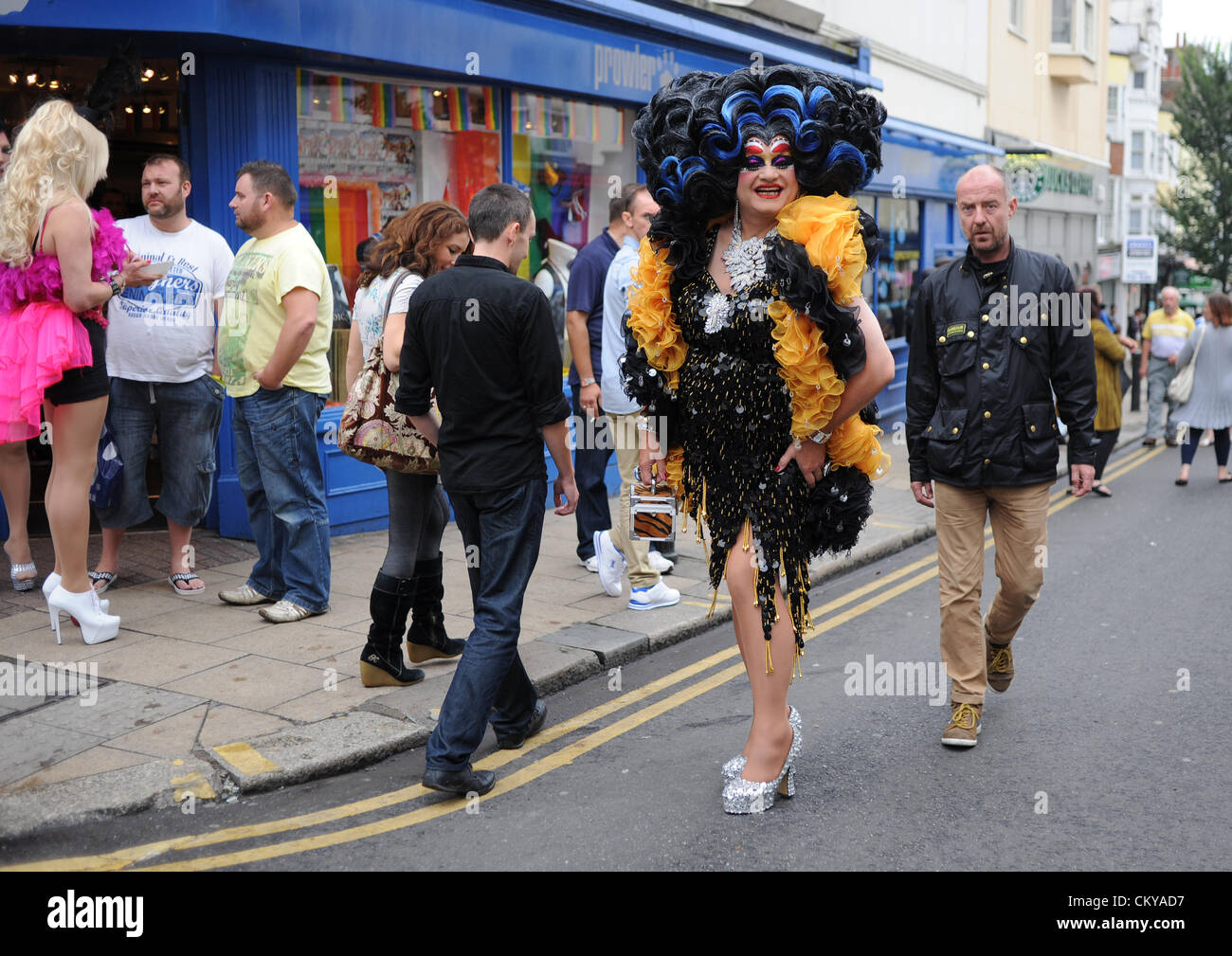 Brighton UK 2nd September 2012 - Revellers in fabulous outfits enjoy the Gay Village Party in St James's Street Brighton today . The street party is the traditional event held in the Kemptown area of the city the day after the annual Pride Parade Stock Photo