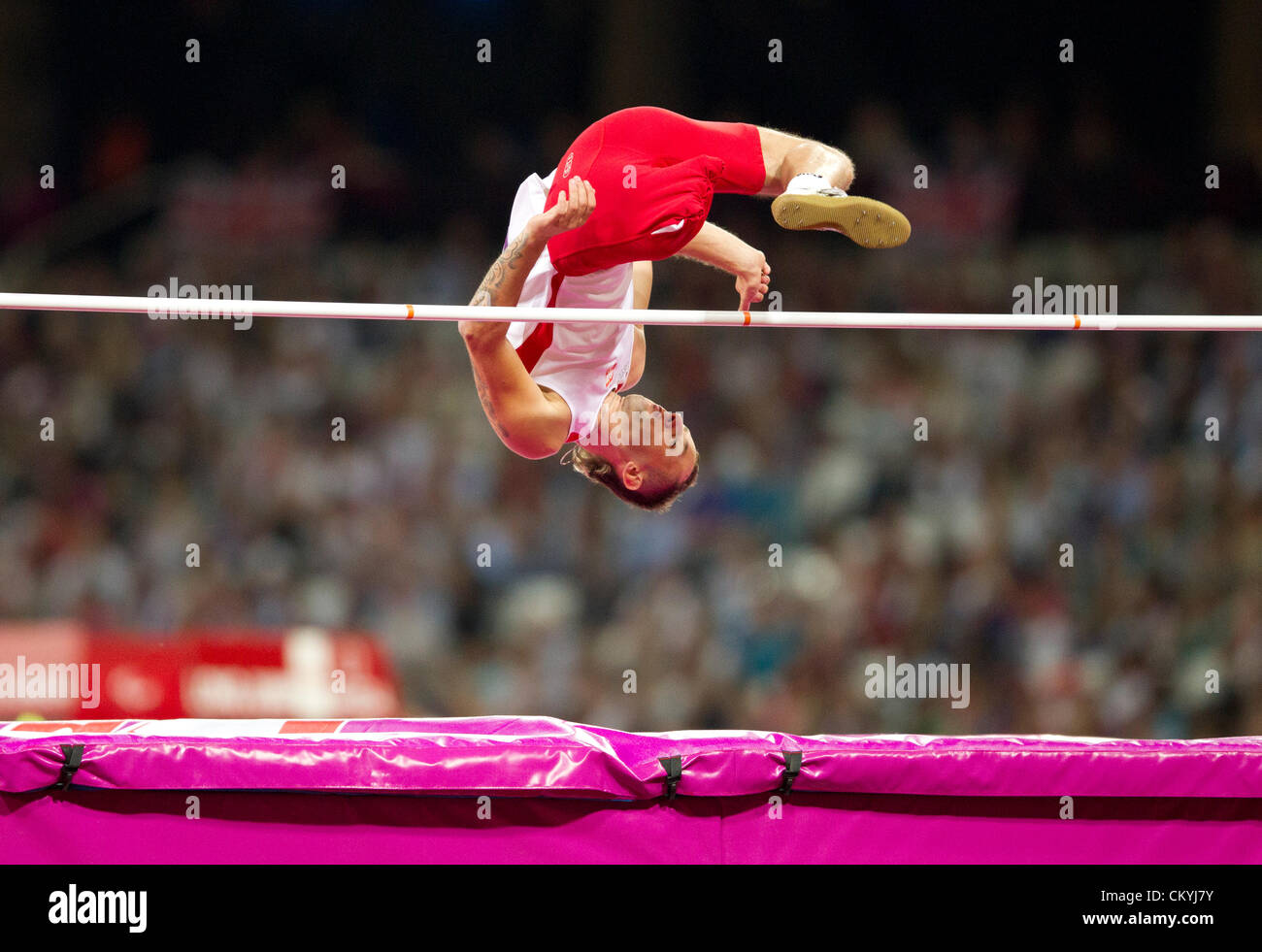 Poland's Lukasz Mamczarz heads over the high jump bar in the F42 class in Olympic Stadium at the London Paralympics Stock Photo