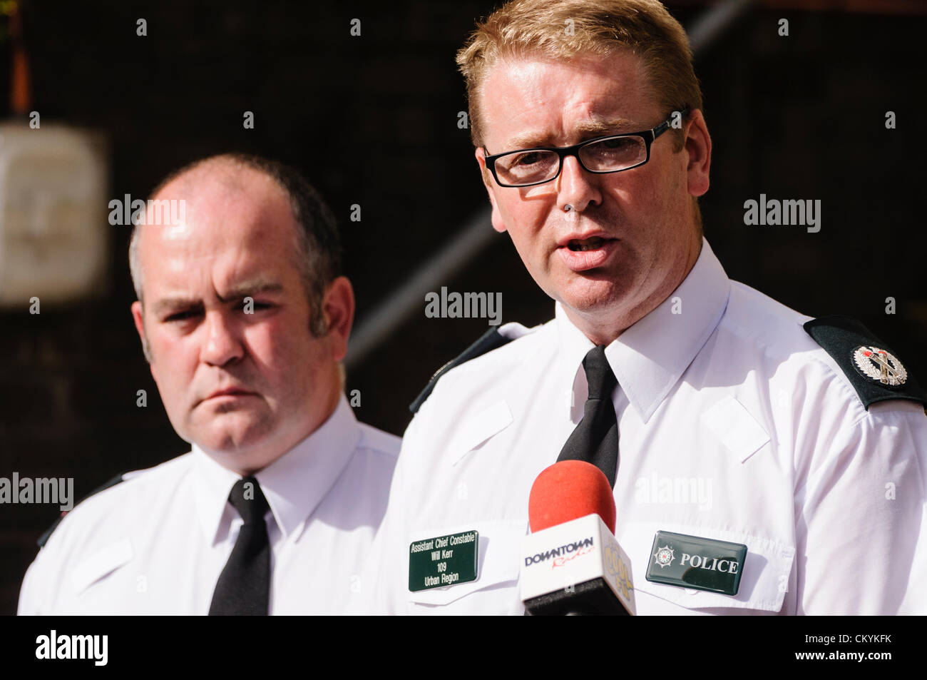 4th September 2012, Belfast - Assistant Chief Constable Will Kerr (right), and Chief Superintendent George Clarke (District Commander A District) hold a press conference regarding two successive nights of rioting in Belfast. Stock Photo