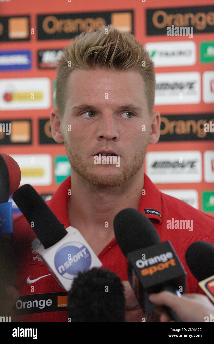 Gdansk, Poland 4th, September 2012 Press conference during Polish National Football Team redying to Poland v Montenegro game, wich will take place on 7th September in Montenegro. Player Eugen Polanski  takes part in the press conference Stock Photo