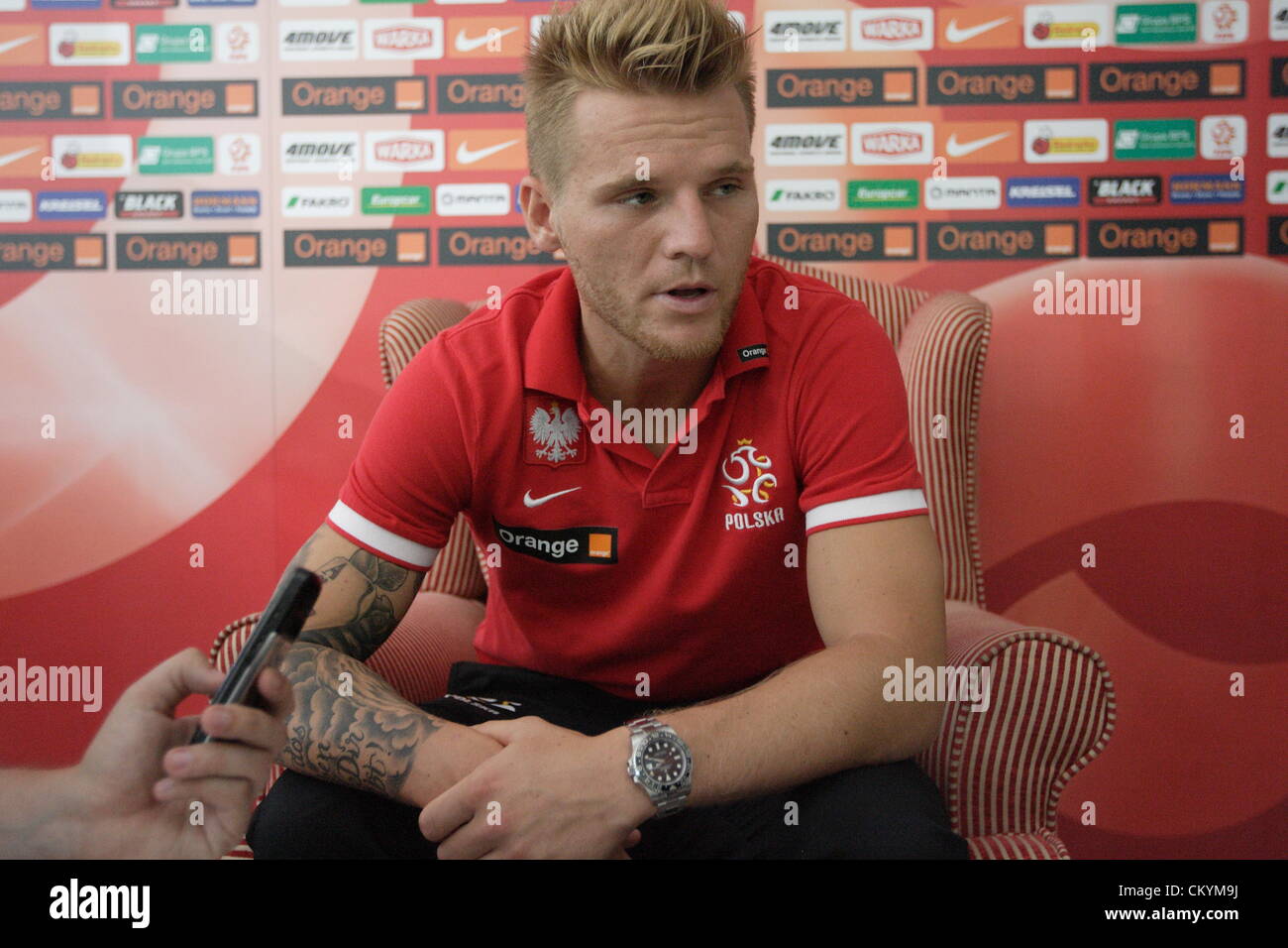 Gdansk, Poland 4th, September 2012 Press conference during Polish National Football Team redying to Poland v Montenegro game, wich will take place on 7th September in Montenegro. Player Eugen Polanski  takes part in the press conference Stock Photo