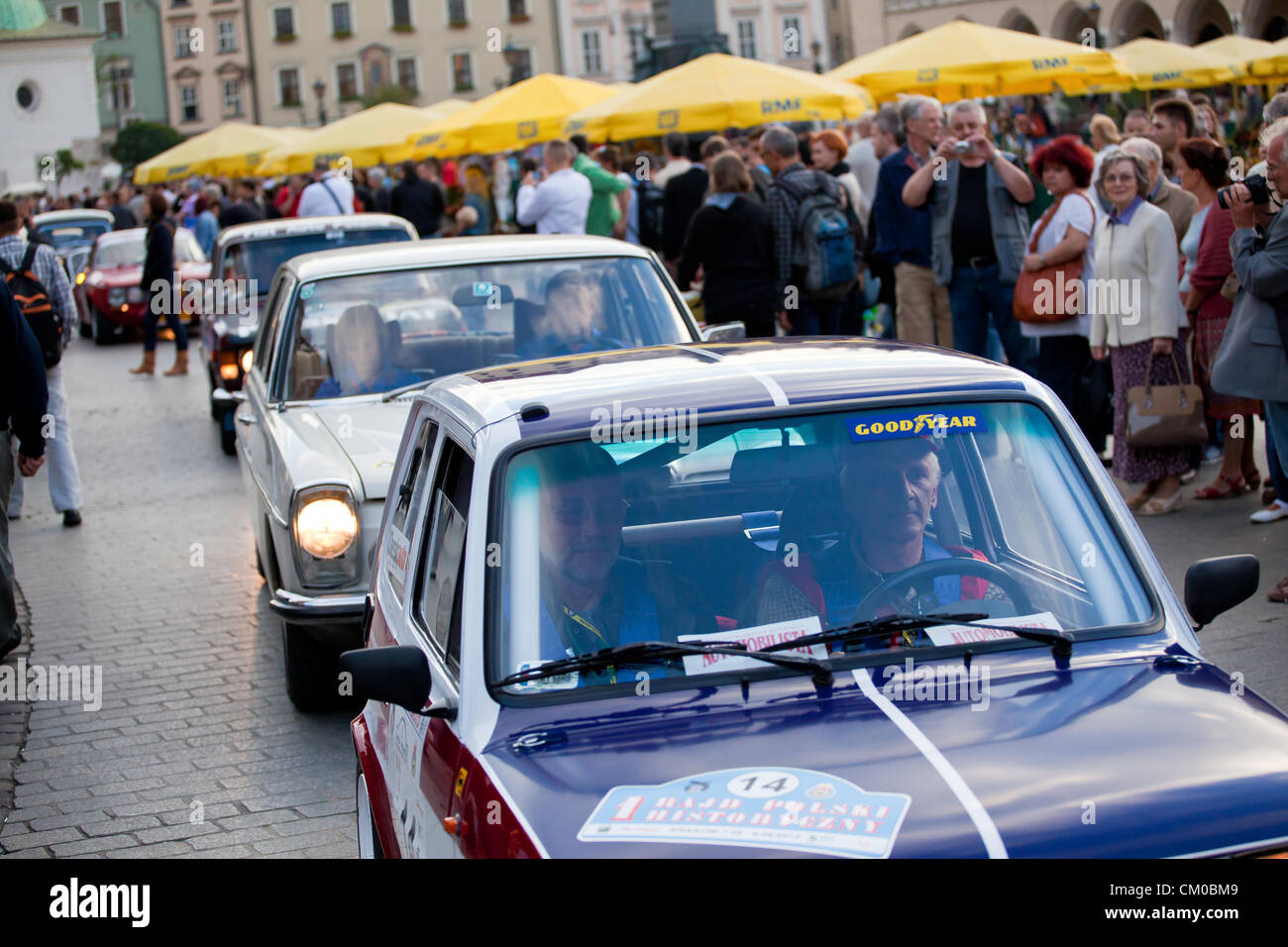 September 07, 2012. Cracow, Poland - Start of the 1st Historic Rally Poland. The rally refer to the tradition of Poland Rally and its formula to Rallye Monte Carlo Historique. Rally Poland is the second oldest automobile rally in the world, after the famous Monte Carlo Rally. It is also the most prestigious and biggest event in automobile sports in Poland and Central Europe. The first edition of the rally took place in 1921. Today, for the first time its historical edition has been started. Stock Photo