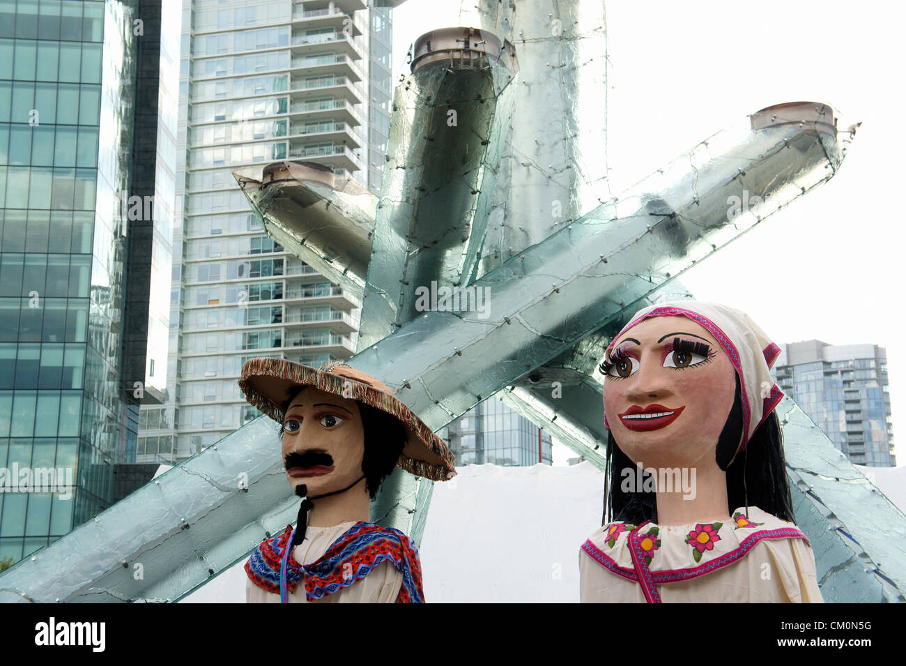 Giant Mexican puppets or mojigangas at  Mexico Fest  celebrations in Vancouver, British Columbia, Canada. Stock Photo