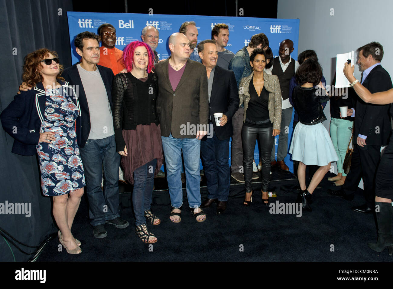 Sept. 9, 2012 - Toronto, Ontario, Canada - (L-R) Actor SUSAN SARANDON, director TOM TYKWER, actor KEITH DAVID,  director LANA WACHOWSKI, actor JIM BROADBENT, director ANDY WACHOWSKI, actors HUGO WEAVING, TOM HANKS, JAMES D''ARCY, HALLE BERRY, JIM STURGESS, DONNA BAE, DAVID GYASI, ZHOU XUN, BEN WHISHAW and HUGH GRANT attend 'Cloud Atlas' Photo Call during the 2012 Toronto International Film Festival at TIFF Bell Lightbox on September 9, 2012 in Toronto, Canada. (Credit Image: © Igor Vidyashev/ZUMAPRESS.com) Stock Photo