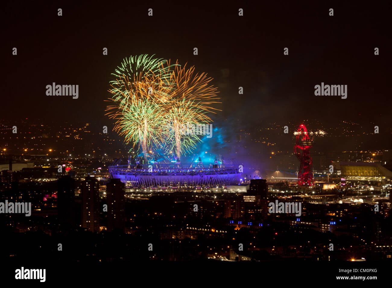 LONDON, UK, 9th Sep, 2012. Fireworks light up the sky over the Olympic Stadium during the 2012 Paralympics closing ceremony, as seen from Canary Wharf, the financial centre in London's historic docklands. Stock Photo