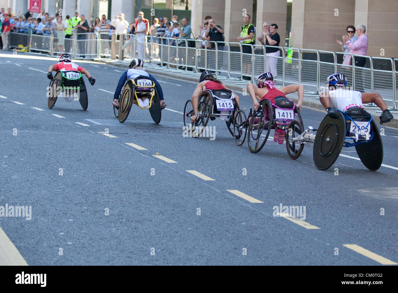 London, UK. 9th September 2012. Racing along Newgate Street in the City of London, left to right, Sandra Graf (Swiss, Gold Medal WInner), Shelly Woods (Team GB, Silver) , USA's Shirley Reilly (Gold Medal Winner), USA's Amanda McGrory (4th), unknown Stock Photo