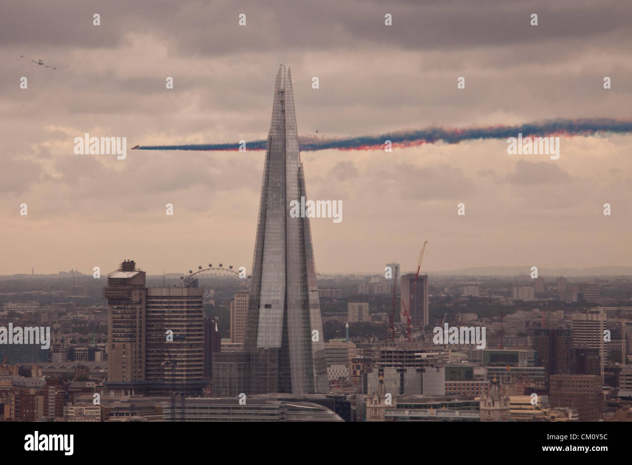 LONDON, UK, 10th Sep, 2012. The Royal Air Force Red Arrows aerobatic display team perform a flypast over London as a tribute to the Team GB Olympic and Paralympic athletes. Credit:  Steve Bright / Alamy Live News Stock Photo