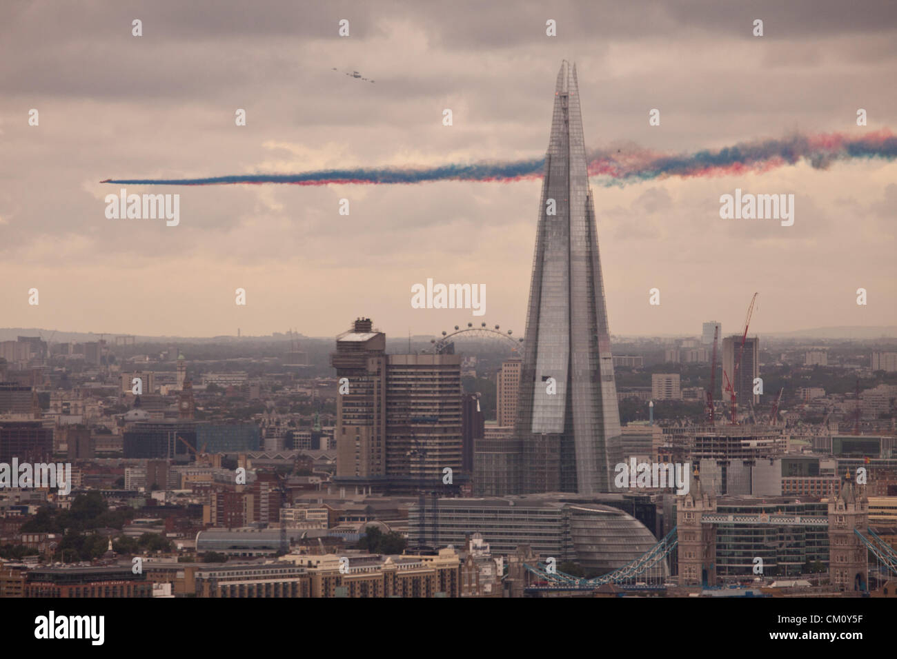 LONDON, UK, 10th Sep, 2012. The Royal Air Force Red Arrows aerobatic display team perform a flypast over London as a tribute to the Team GB Olympic and Paralympic athletes. Credit:  Steve Bright / Alamy Live News Stock Photo