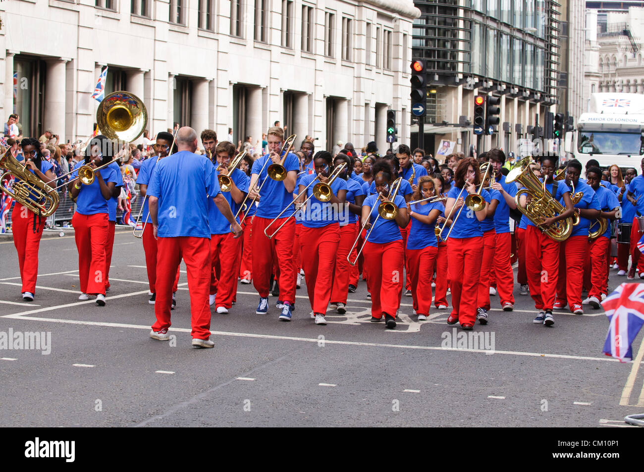 London 2012, Our Greatest Team Athletes Parade, 10 Sept. 2012 - Cannon Street, near St. Paul's cathedral - the parade is led by Olympic and Paralympic lions and a marching band Stock Photo