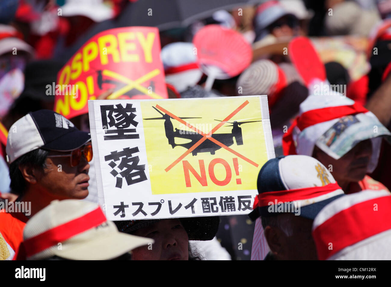 September 9, 2012, Okinawa, Japan - Demonstrators hold placards during ...