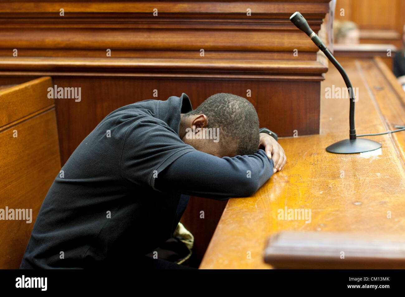 CAPE TOWN, SOUTH AFRICA: Xolile Mngeni appears in the Cape High Court on September 10, 2012 in connection with the murder of Anni Dewani in Cape Town, South Africa. Mngeni is accused of shooting Anni, in a murder allegedly plotted by her British husband Shrien Dewani. (Photo by Gallo Images / Foto24 / Ruan Springorum) Stock Photo