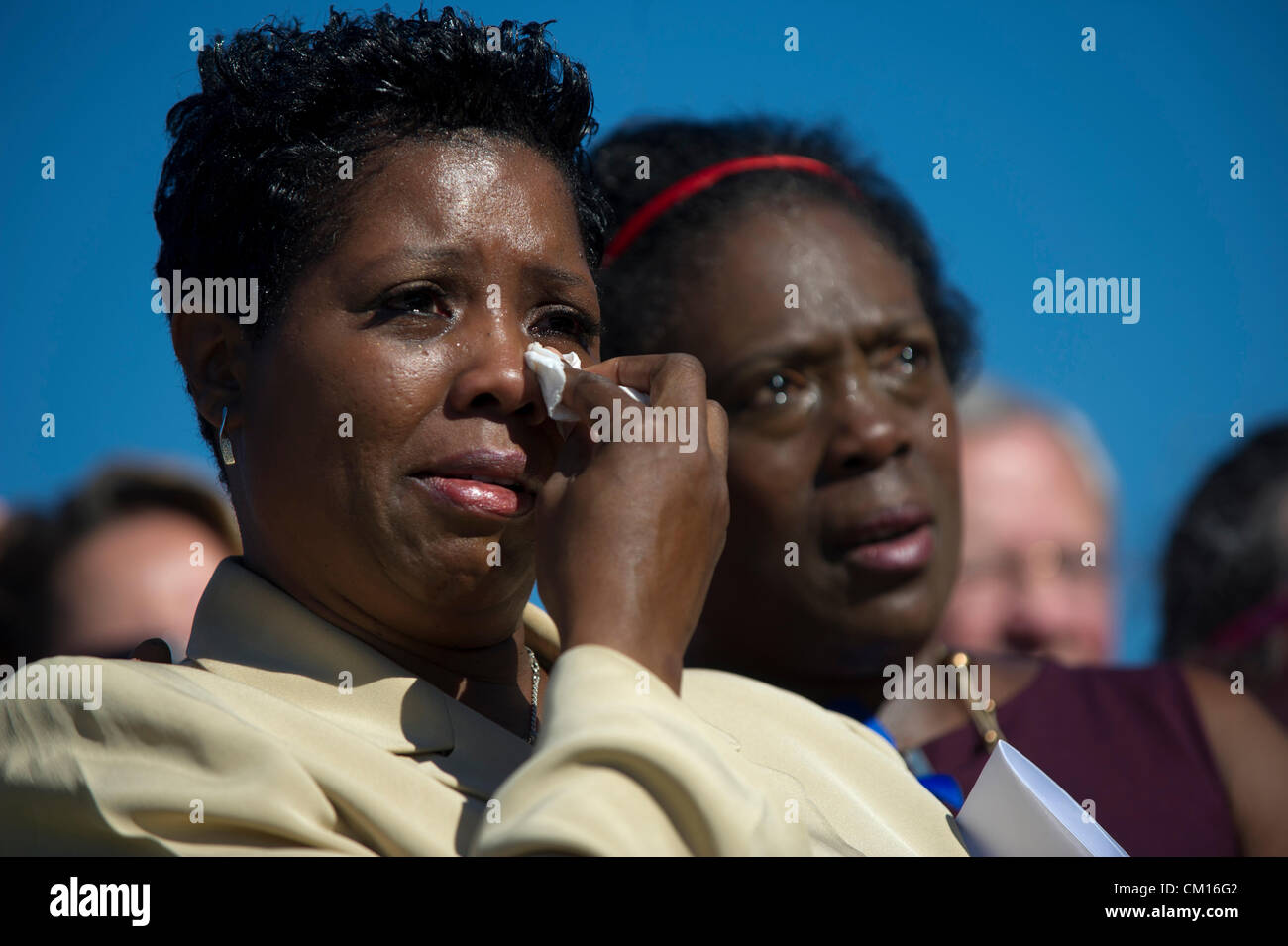 Pentagon terrorism survivors Linda Irving and Aline Tyler attend a ceremony commemorating the 11th anniversary of the 9/11, 2001 terrorist attacks on the Pentagon September 11, 2012 in Pentagon City, VA. Stock Photo