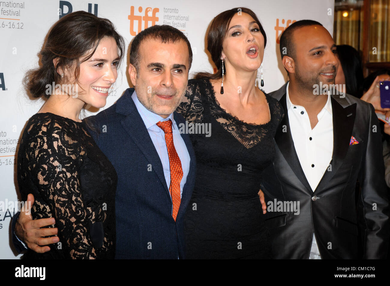 Sept. 12, 2012 - Toronto, Ontario, Canada - Actress BELCIM BILGIN, actor ARASH LABAF,  MONICA BELLUCCI  and writer/Director/Producer BAHMAN GHOBADI (R) attend the 'Rhino Season' premiere during the 2012 Toronto International Film Festival at The Elgin on September 12, 2012 in Toronto, Canada. (Credit Image: © Igor Vidyashev/ZUMAPRESS.com) Stock Photo
