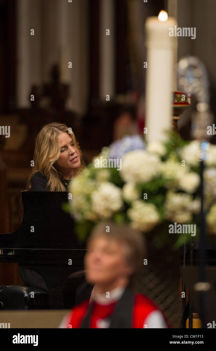 Musician Diana Krall sings Fly Me to the Moon during a memorial service celebrating the life of Neil Armstrong September 13, 2012 at the National Cathedral in Washington, DC. Armstrong, the first man to walk on the moon during the 1969 Apollo 11 mission, died August 25. He was 82. Stock Photo