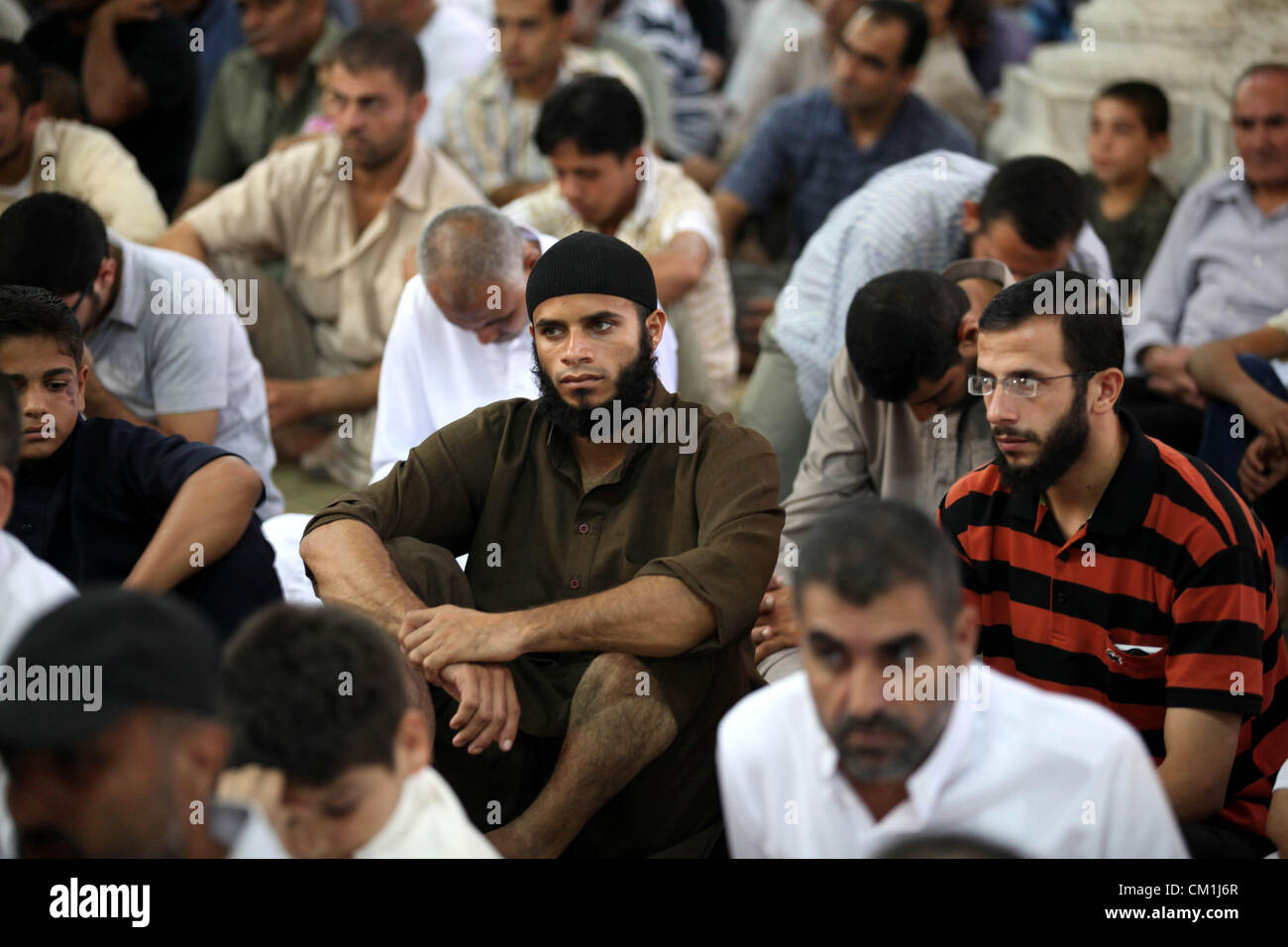 Sept. 14, 2012 - Gaza City, Gaza Strip, Palestinian Territory - Palestinians attend Friday prayers in al-Omari Mosque before a demonstration against the controversial film 'Innocence of Muslims' in Gaza city, on September 14, 2012. The controversial low budget film reportedly made by an Israeli-American which portrays Muslims as immoral and gratuitous, sparked fury in Libya, where four Americans including the ambassador were killed on Tuesday when a mob attacked the US consulate in Benghazi, and has led to protests outside US missions in Morocco, Sudan, Egypt, Tunisia and Yemen  (Credit Image: Stock Photo