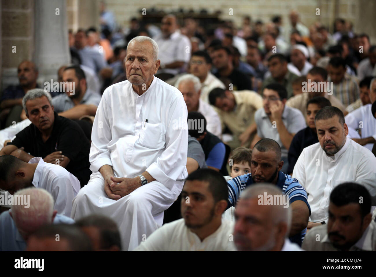 Sept. 14, 2012 - Gaza City, Gaza Strip, Palestinian Territory - Palestinians attend Friday prayers in al-Omari Mosque before a demonstration against the controversial film 'Innocence of Muslims' in Gaza city, on September 14, 2012. The controversial low budget film reportedly made by an Israeli-American which portrays Muslims as immoral and gratuitous, sparked fury in Libya, where four Americans including the ambassador were killed on Tuesday when a mob attacked the US consulate in Benghazi, and has led to protests outside US missions in Morocco, Sudan, Egypt, Tunisia and Yemen  (Credit Image: Stock Photo