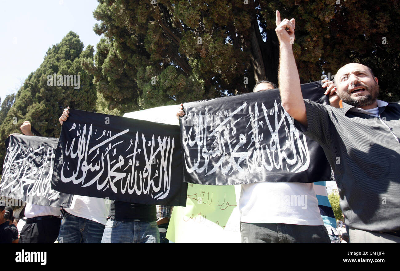 Sept. 14, 2012 - Jerusalem, Jerusalem, Palestinian Territory - Palestinians shout slogans during a demonstration against the controversial film 'Innocence of Muslims' in front of al-Aqsa Mosqe in Jerusalem, on September 14, 2012. The controversial low budget film reportedly made by an Israeli-American which portrays Muslims as immoral and gratuitous, sparked fury in Libya, where four Americans including the ambassador were killed on Tuesday when a mob attacked the US consulate in Benghazi, and has led to protests outside US missions in Morocco, Sudan, Egypt, Tunisia and Yemen  (Credit Image: © Stock Photo