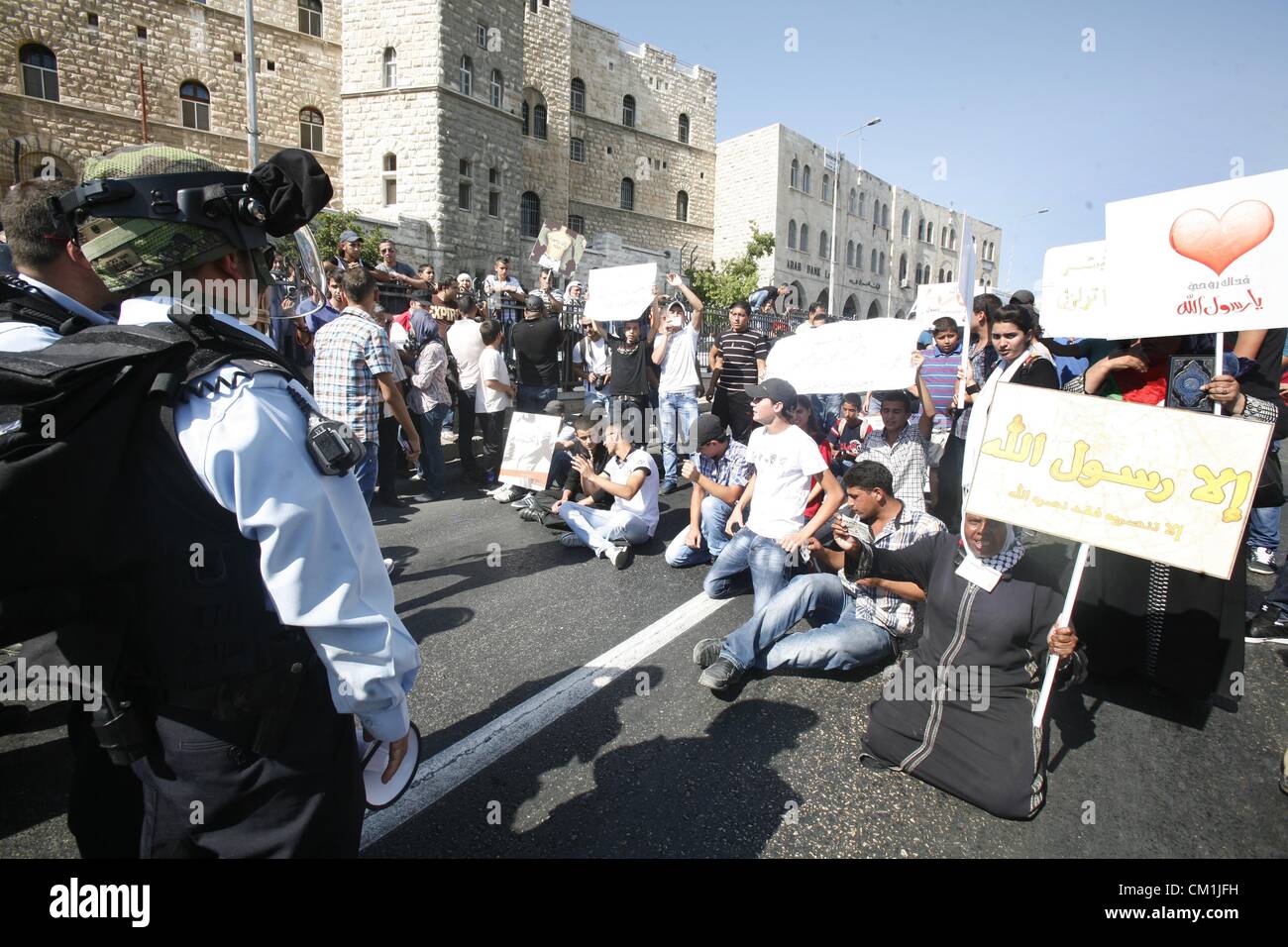 Sept. 14, 2012 - Jerusalem, Jerusalem, Palestinian Territory - Israeli policemen repress a demonstration against the controversial film 'Innocence of Muslims' in front of al-Aqsa Mosqe in Jerusalem, on September 14, 2012. The controversial low budget film reportedly made by an Israeli-American which portrays Muslims as immoral and gratuitous, sparked fury in Libya, where four Americans including the ambassador were killed on Tuesday when a mob attacked the US consulate in Benghazi, and has led to protests outside US missions in Morocco, Sudan, Egypt, Tunisia and Yemen  (Credit Image: © Mahfouz Stock Photo