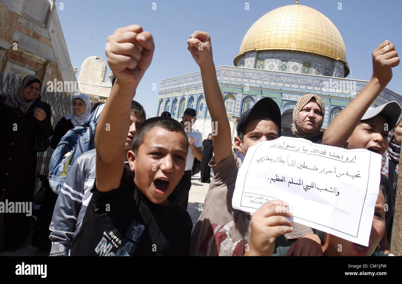 Sept. 14, 2012 - Jerusalem, Jerusalem, Palestinian Territory - Palestinians shout slogans during a demonstration against the controversial film 'Innocence of Muslims' in front of al-Aqsa Mosqe in Jerusalem, on September 14, 2012. The controversial low budget film reportedly made by an Israeli-American which portrays Muslims as immoral and gratuitous, sparked fury in Libya, where four Americans including the ambassador were killed on Tuesday when a mob attacked the US consulate in Benghazi, and has led to protests outside US missions in Morocco, Sudan, Egypt, Tunisia and Yemen  (Credit Image: © Stock Photo