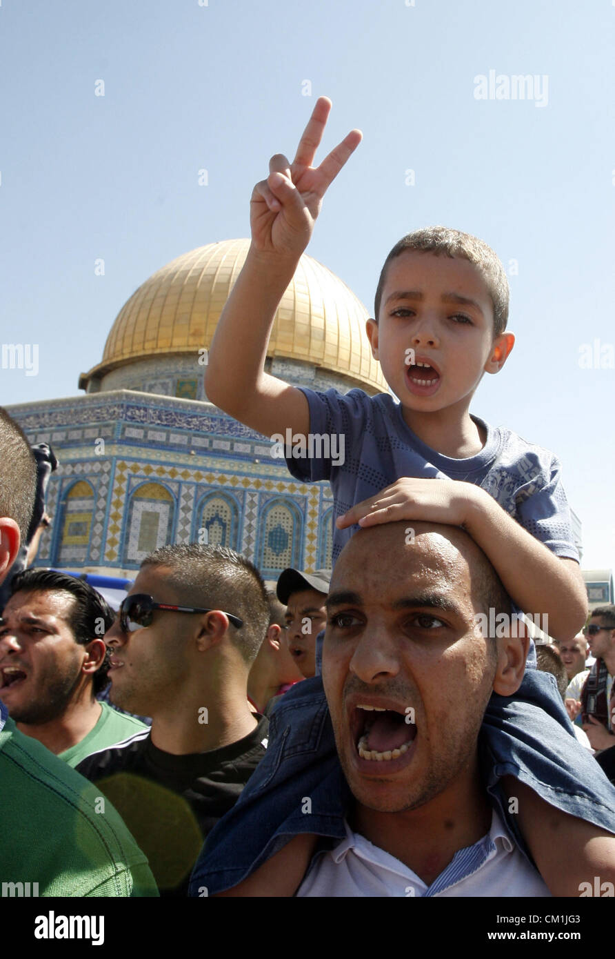 Sept. 14, 2012 - Jerusalem, Jerusalem, Palestinian Territory - Palestinians shout slogans during a demonstration against the controversial film 'Innocence of Muslims' in front of al-Aqsa Mosqe in Jerusalem, on September 14, 2012. The controversial low budget film reportedly made by an Israeli-American which portrays Muslims as immoral and gratuitous, sparked fury in Libya, where four Americans including the ambassador were killed on Tuesday when a mob attacked the US consulate in Benghazi, and has led to protests outside US missions in Morocco, Sudan, Egypt, Tunisia and Yemen  (Credit Image: © Stock Photo