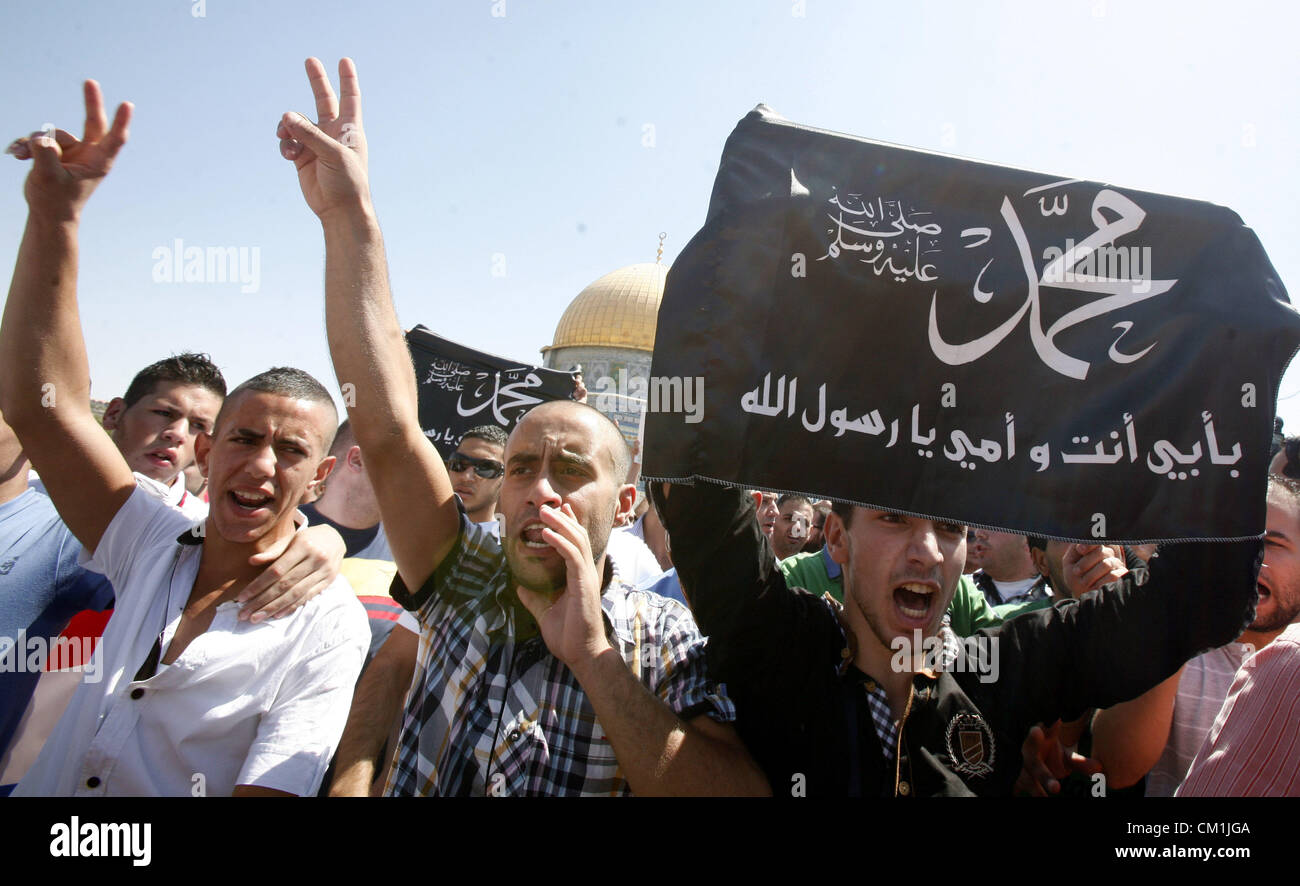 Sept. 14, 2012 - Jerusalem, Jerusalem, Palestinian Territory - Palestinians shout slogans during a demonstration against the controversial film 'Innocence of Muslims' in front of al-Aqsa Mosqe in Jerusalem, on September 14, 2012. The controversial low budget film reportedly made by an Israeli-American which portrays Muslims as immoral and gratuitous, sparked fury in Libya, where four Americans including the ambassador were killed on Tuesday when a mob attacked the US consulate in Benghazi, and has led to protests outside US missions in Morocco, Sudan, Egypt, Tunisia and Yemen  (Credit Image: © Stock Photo