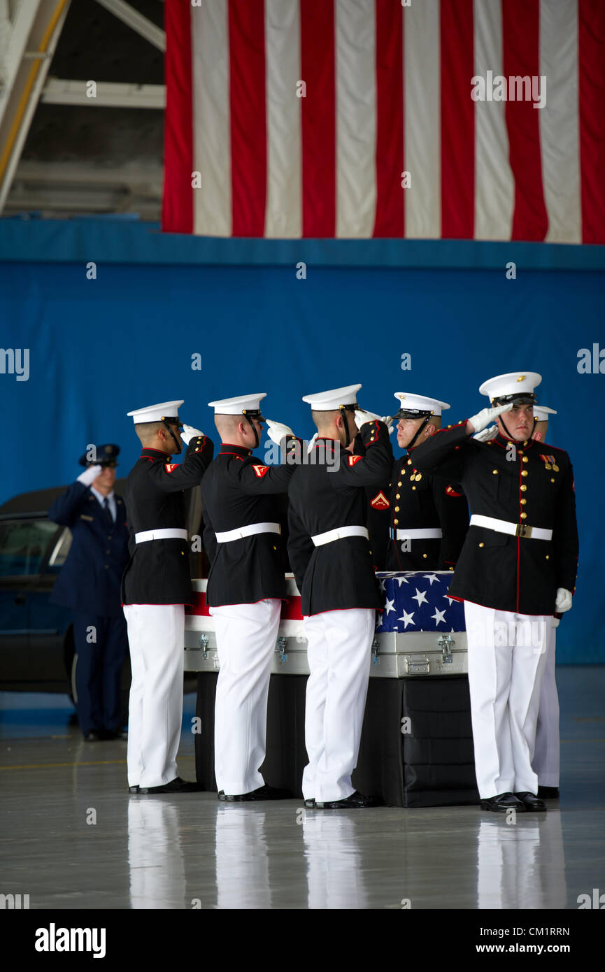 The United States Marine Corps Honor Guard prepares to  carry the remains of four American's killed by mobs at the Benghazi Consulate during a transfer ceremony for the September 14, 2012 at Joint Base Andrews, Maryland. Stock Photo