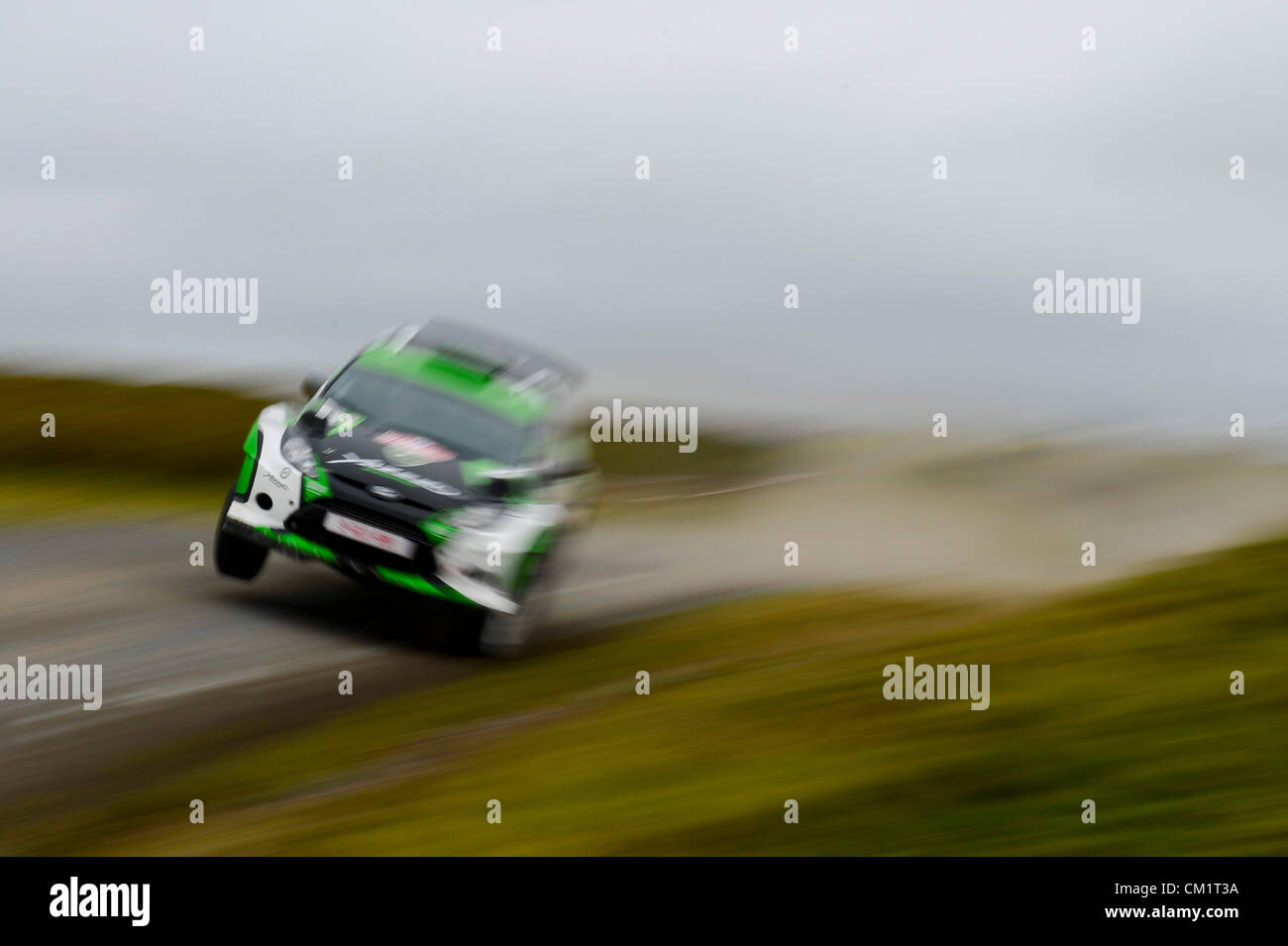 15.09.2012 Powys, Wales. Yazeed Al Rajhi (SAU) and Co-Driver Michael Orr (GBR) in the #36 Yazeed Racing Ford Fiesta S2000 take the jump on the second pass of the Halfway stage (SS11) during Day 2 of Wales Rally GB, Round 10 of the FIA Word Rally Championship. Stock Photo