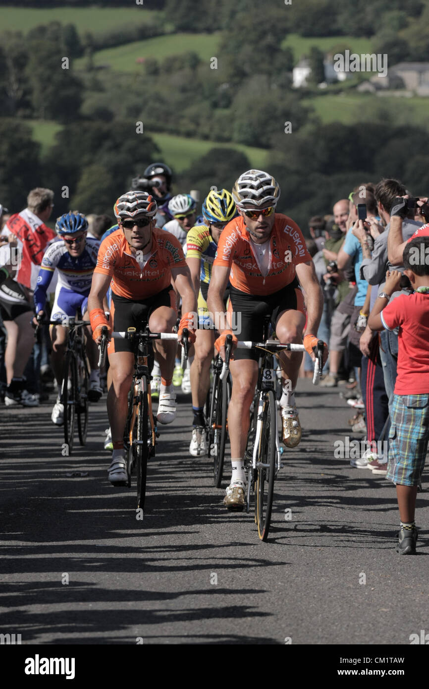 Breakaway group led by eventual stage winner  Pablo Urtasun (Spa) Euskaltel - Euskadi  and team mate Samuel Sanchez (Spa) Euskaltel - Euskadi climbing first category hill Coffin Stone on Dartmoor Tour of Britain  15 September 2012 stage 7 from Barnstaple to Dartmouth Devon UK Stock Photo