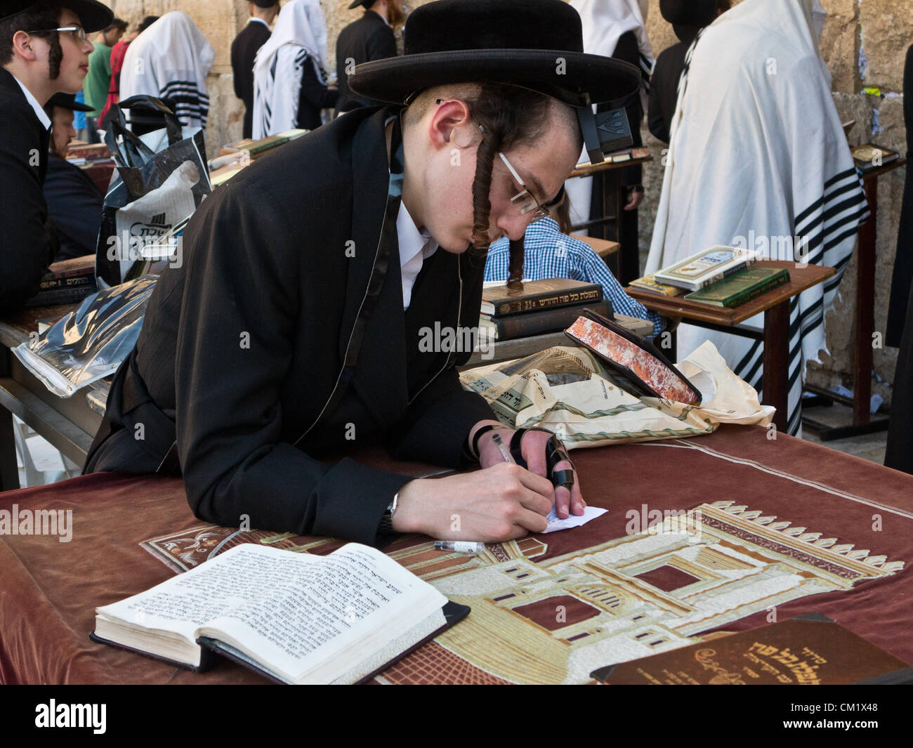 A young religious ultra-Orthodox man contemplates his ...
