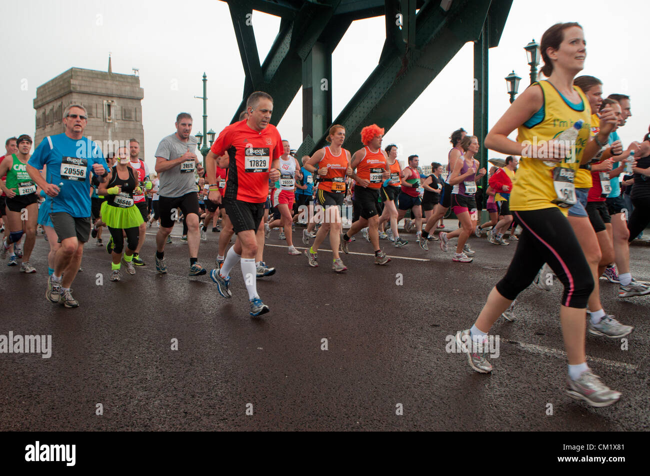 Newcastle, UK, Sunday September 16th, 2012. Runners take part in the 2012 Great North Run in Newcastle Upon Tyne. The event attracted a record 55000 competitors this year. Stock Photo