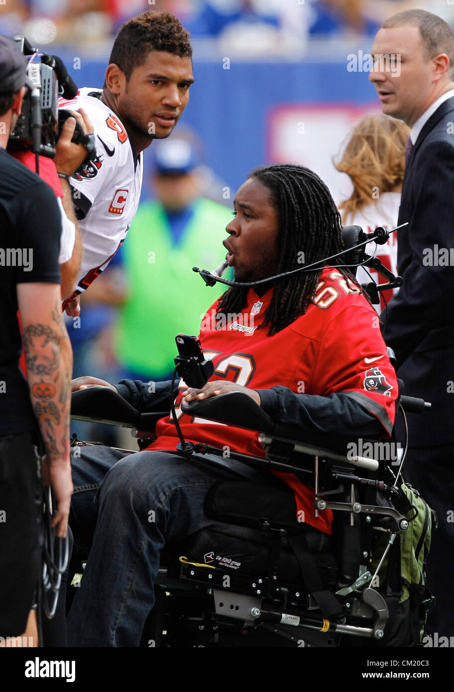 Sept. 16, 2012 - Florida, U.S. - Tampa Bay Buccaneers quarterback Josh Freeman (5) talks to Eric LeGrand after the coin toss. FIRST HALF ACTION: The Tampa Bay Buccaneers play the New York Giants at MetLife Stadium in East Rutherford, N.J. on Sunday. At halftime, the Bucs are winning 24-13. (Credit Image: © Daniel Wallace/Tampa Bay Times/ZUMAPRESS.com) Stock Photo