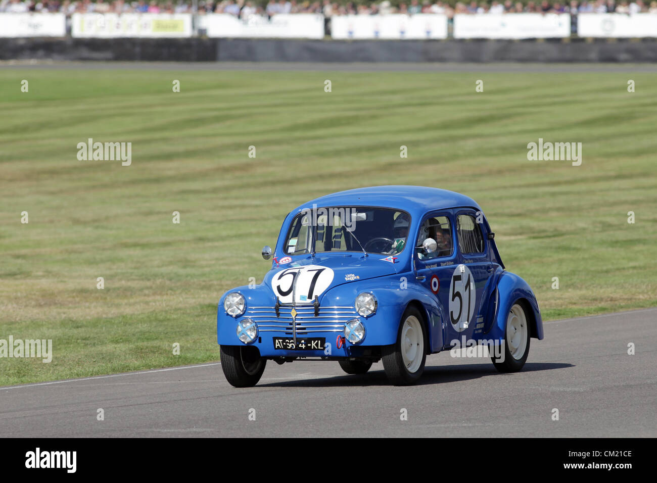 Goodwood Estate, Chichester, UK. 15th September 2012. Stuart Graham driving a Renault 4CV during the St Mary's Trophy at the Goodwood Revival. The revival is a 'magical step back in time', showcasing a mixture of cars and aviation from the 40's, 50's and 60's and is one of the most popular historical motor racing events in the world. For more information visit www.goodwood.co.uk/revival. Stock Photo