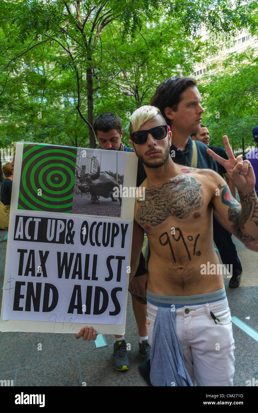 New York,NY, USA, protesters Holding Protest Signs, Protest, 'Occupy Wall Street', 'Act Up New York' AIDS hiv Activist, act up poster, political participation youth Stock Photo