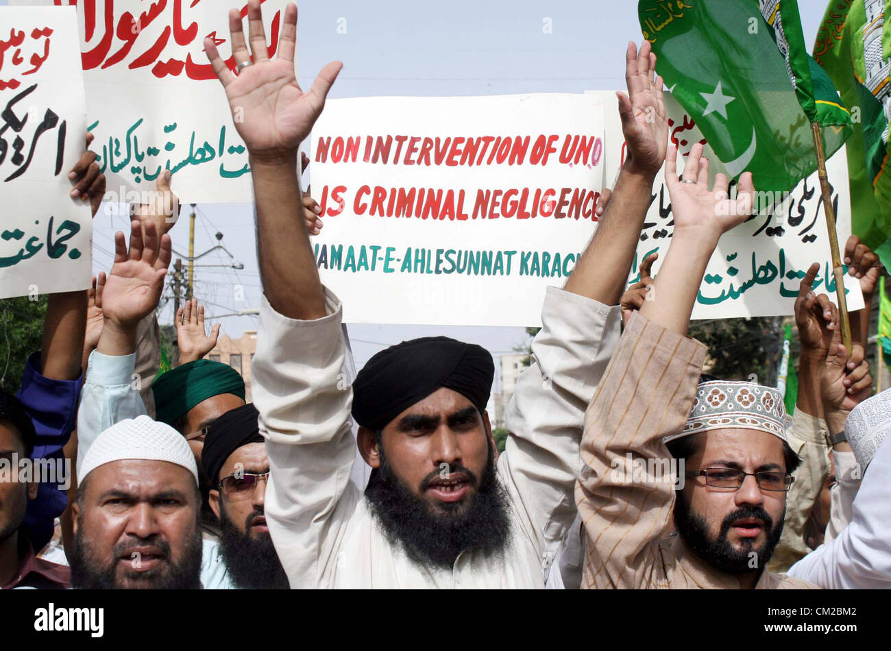 KARACHI, PAKISTAN, SEP 19: Activists of Jamat-e-Ahle Sunnat chant slogans against  blasphemy anti-Islamic movie released on the Internet by USA, during a protest rally at M.A  Jinnah road in Karachi on Wednesday, September 19, 2012. Protest against sacrilegious film  continues in all over Muslim World now a day. (S.Imran Ali/PPI Images). Stock Photo