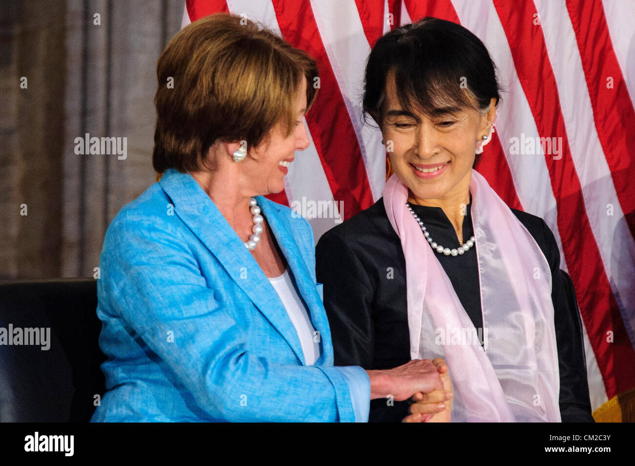 Sept. 19, 2012 - U.S. - House Minority Leader NANCY PELOSI (D-CA) sits with Burmese activist AUNG SAN SUU KYI at a ceremony on Capitol Hill where Members of Congress presented  the Congressional Gold Medal that she was awarded in absentia in 2008 when she was still under house arrest for opposing military rule in Myanmar now known as Burma. (Credit Image: © Pete Marovich/ZUMAPRESS.com) Stock Photo