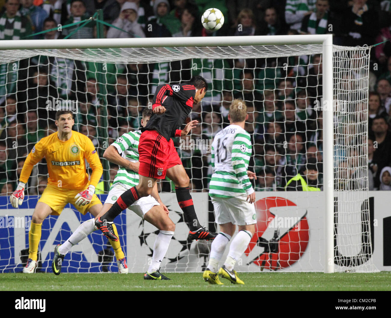 UEFA Champions League Football - Season 2012-13 Group G. Celtic FC v  Benfica FC. Celtic's Miku holds of Benfica's jardel in action during The  UEFA Champions League Group G match between Celtic
