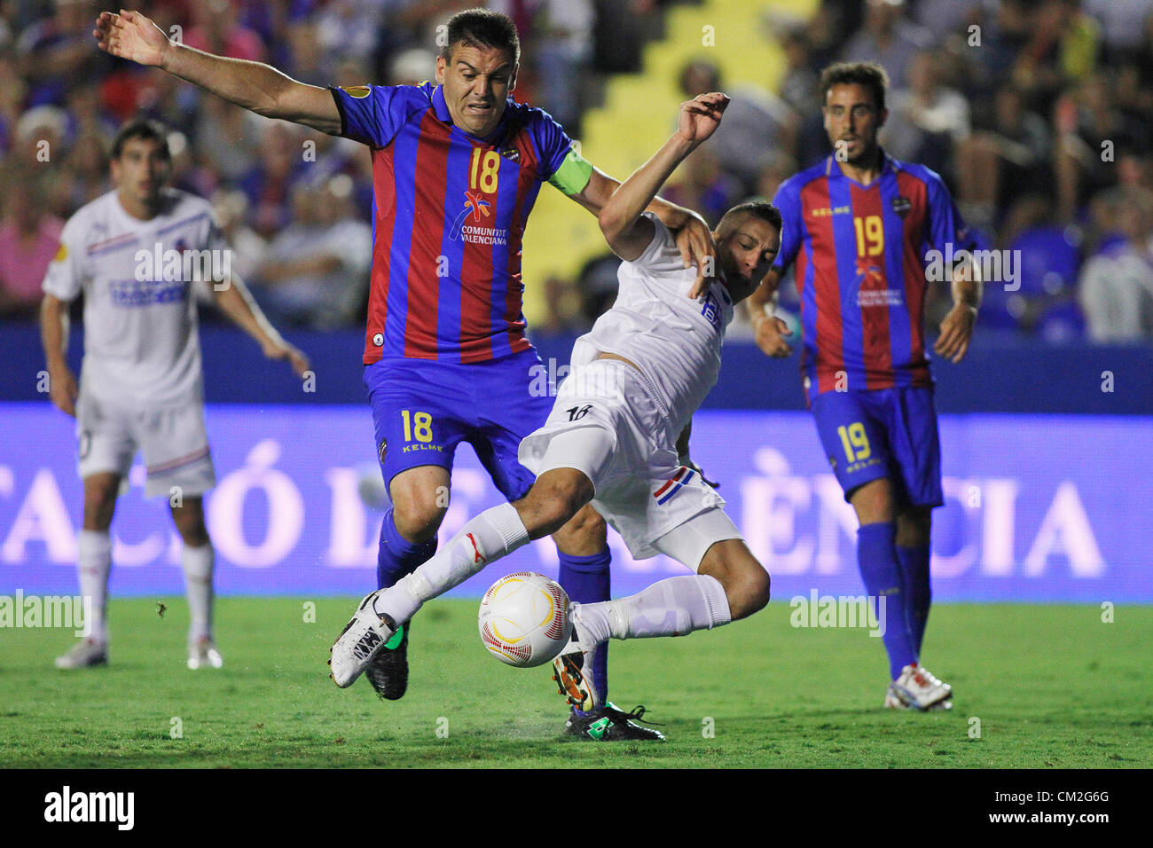 20/09/2012 - Europa League Football Europe, Group Matchday 1, Levante UD vs. Helsingborg - Ballesteeros (left) from Levante UD commits possible penalty against Djurdjic from Helsingborg Stock Photo