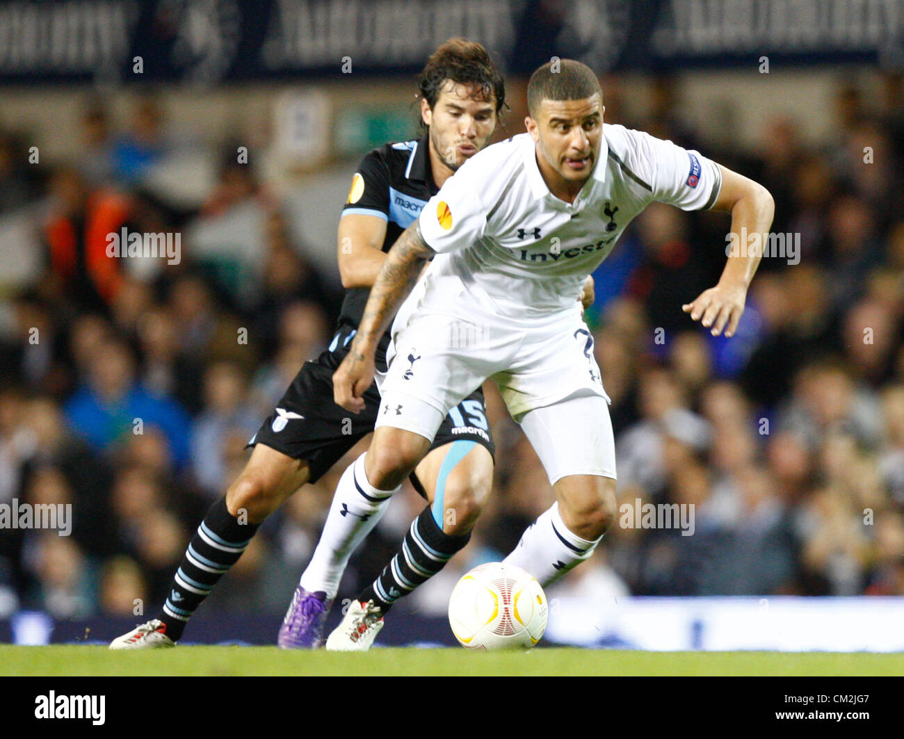 20.09.2012 London, ENGLAND:  Kyle Walker of Tottenham Hotspur holds of Alvaro Gonzalez of S.S. Lazio in action during the Europa League Group J match between Tottenham Hotspur and SS Lazio at White Hart Lane Stadium Stock Photo
