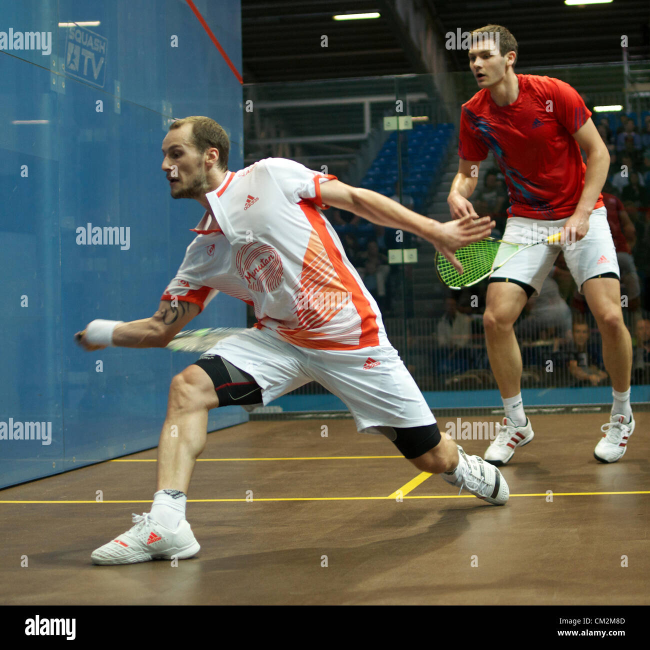 Gregory Gaultier (France).moves to make a forehand  return during his match with Adrian Waller (England). Gaultier won the first round match 11-6.11-7.11-4 in the British Grand Prix at Sportcity, Manchester, UK 21-09-2012 Stock Photo