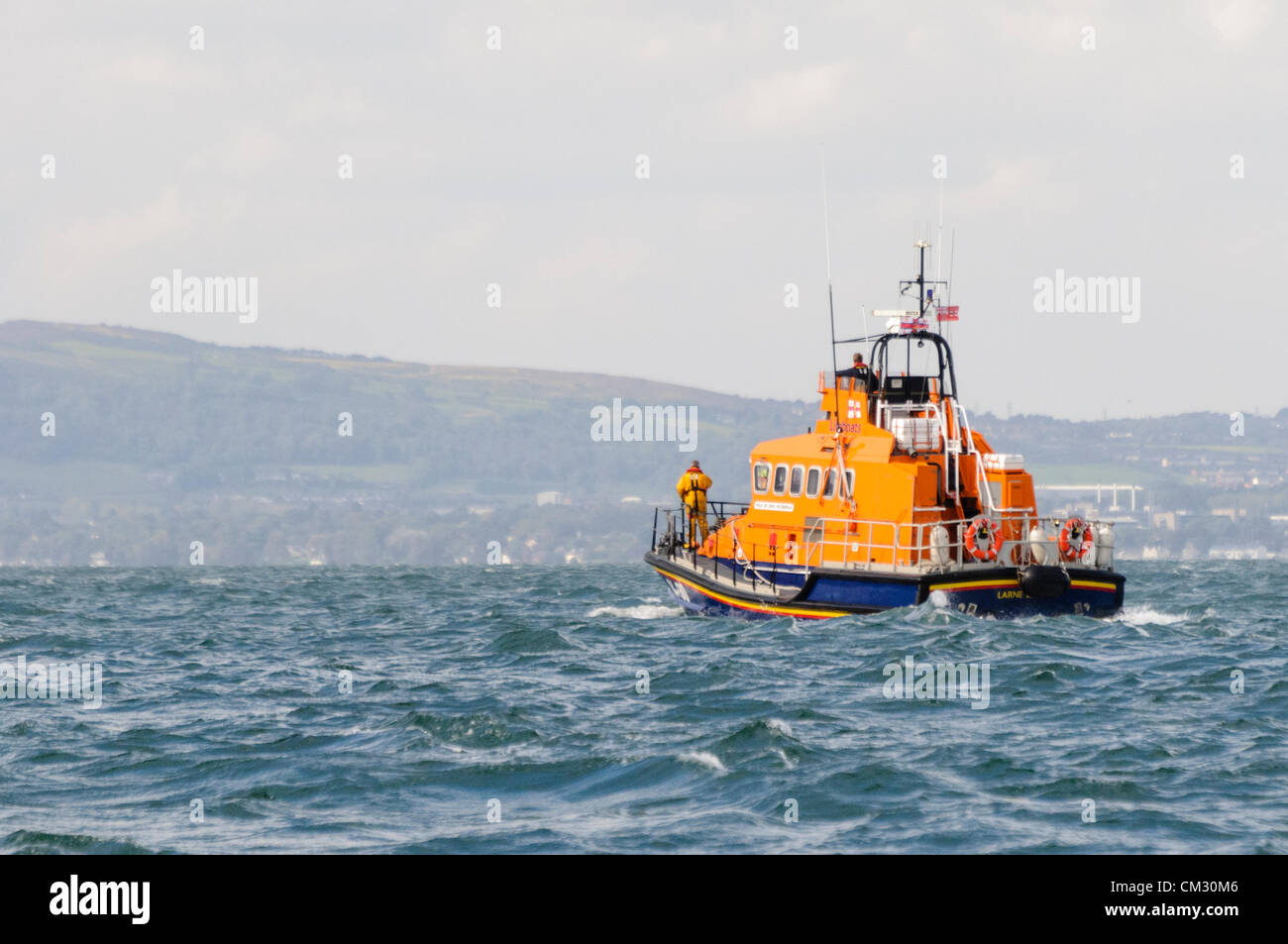 Bangor, County Down. 23/09/2012 - Donaghadee RNLI lifeboat crew scan the sea for survivors and bodies.  Emergency Services hold 'Operation Diamond', a joint training exercise off the coast of North Down. Stock Photo