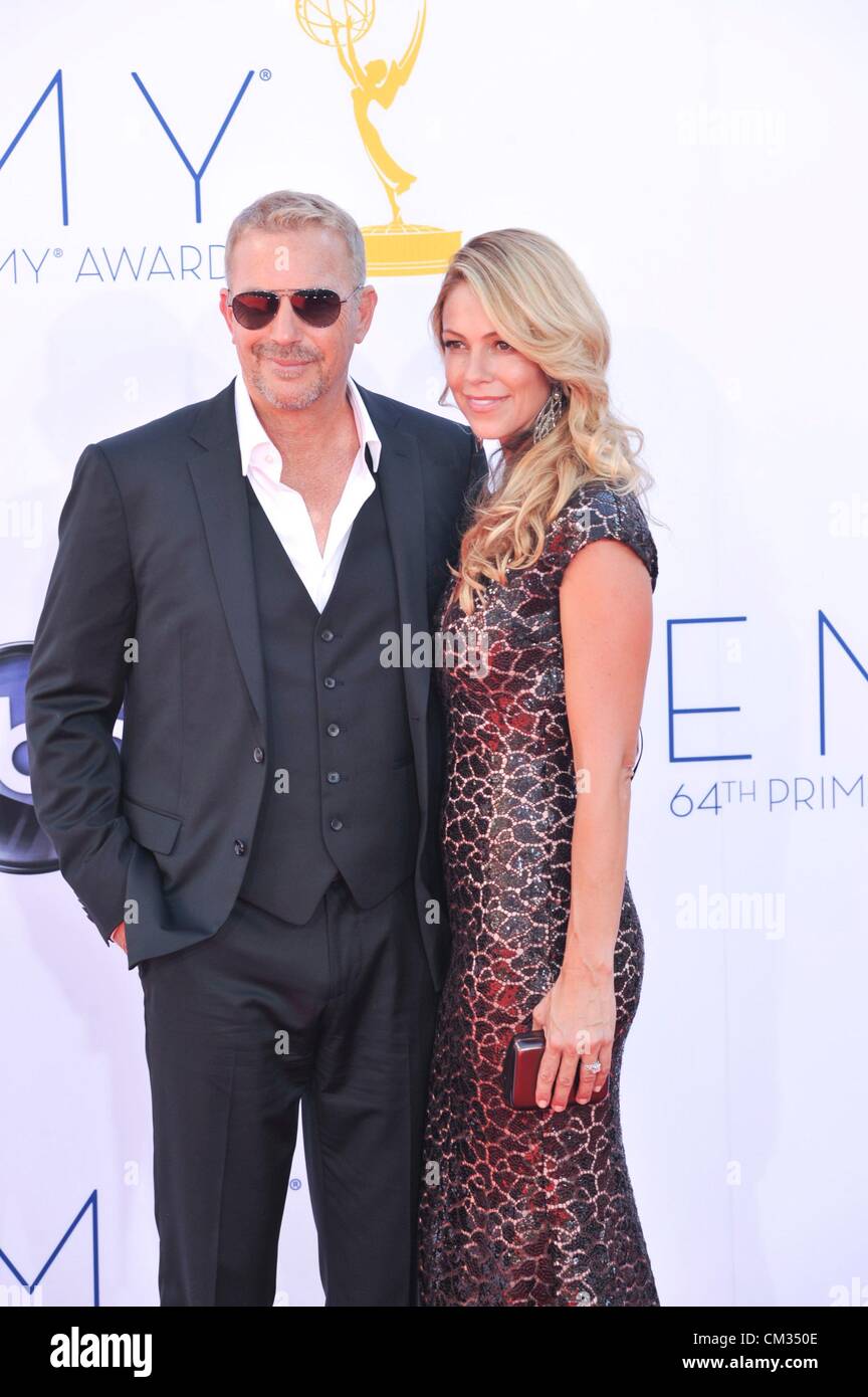 Kevin Costner Christine Baumgartner arrivals64th Primetime Emmy Awards - ARRIVALS Nokia Theatre L.A LIVE Los Angeles CA Stock Photo