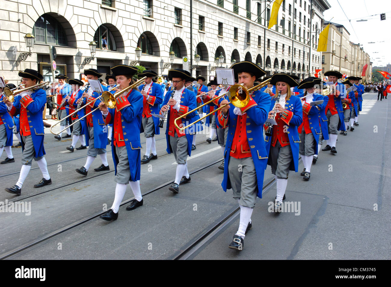 Munich, Germany. 23rd September, 2012. The opening parade of the world's biggest beer-festival, Oktoberfest, proceeds through the city of Munich, Germany. The music brass band of Noerdlingen / Nördlingen, in historical costumes, was part of 8900 participants of this public parade. Stock Photo