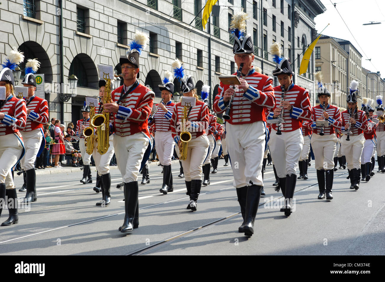 Munich, Germany. 23rd September, 2012. The opening parade of the world's biggest beer-festival, Oktoberfest, proceeds through the city of Munich, Germany. The music brass band of Germering, in historical costumes, was part of 8900 participants of this public parade. Stock Photo
