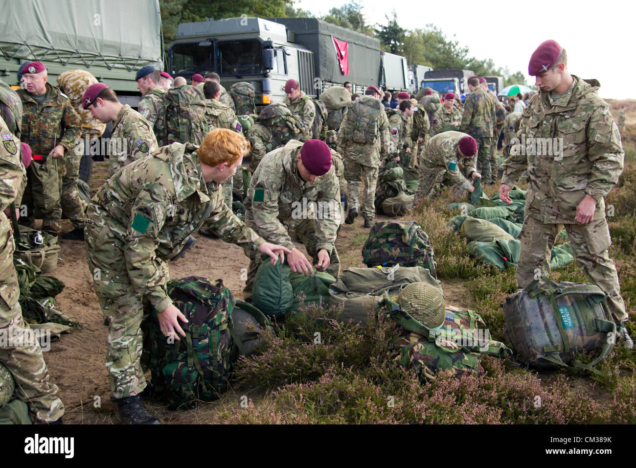 British paratroopers at a gathering point after being parachuted over the Ginkelse Heide at the Market Garden Memorial, Ginkelse Heide, The Netherlands, on Saturday September 22, 2012, 68 years after Operation Market Garden. Market Garden was a large Allied military operation in the same area during September 1944 Stock Photo