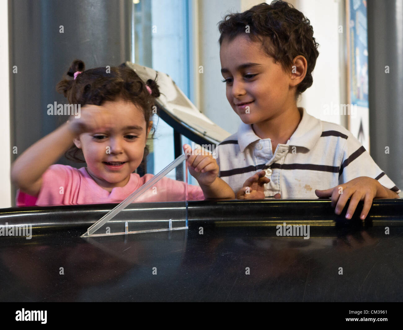 Hands spinning coin hires stock photography and images Alamy
